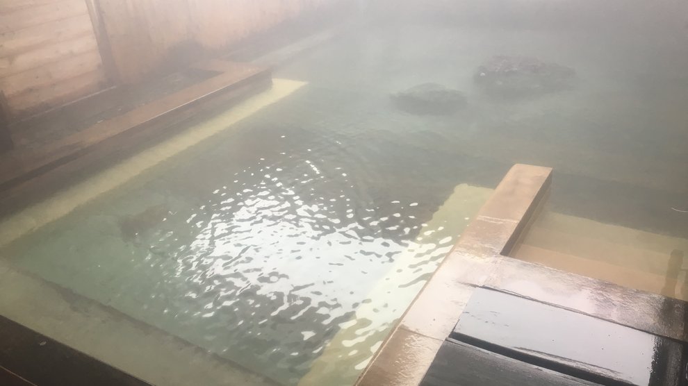 View of a small man-made pool for hot spring water.