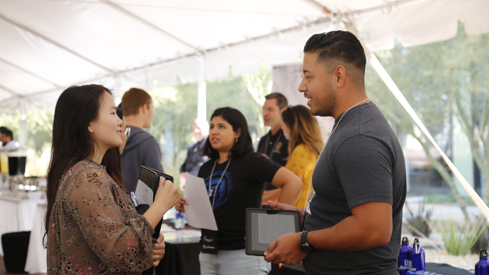 CMS-EE Partner company representative talking to student