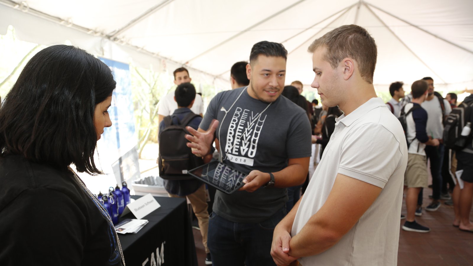 CMS-EE Partner company representative talking to student