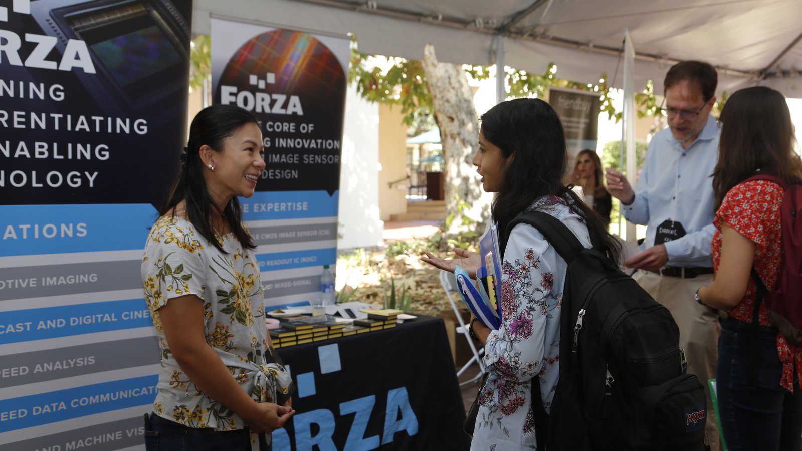 CMS-EE Partner company representative talking to student