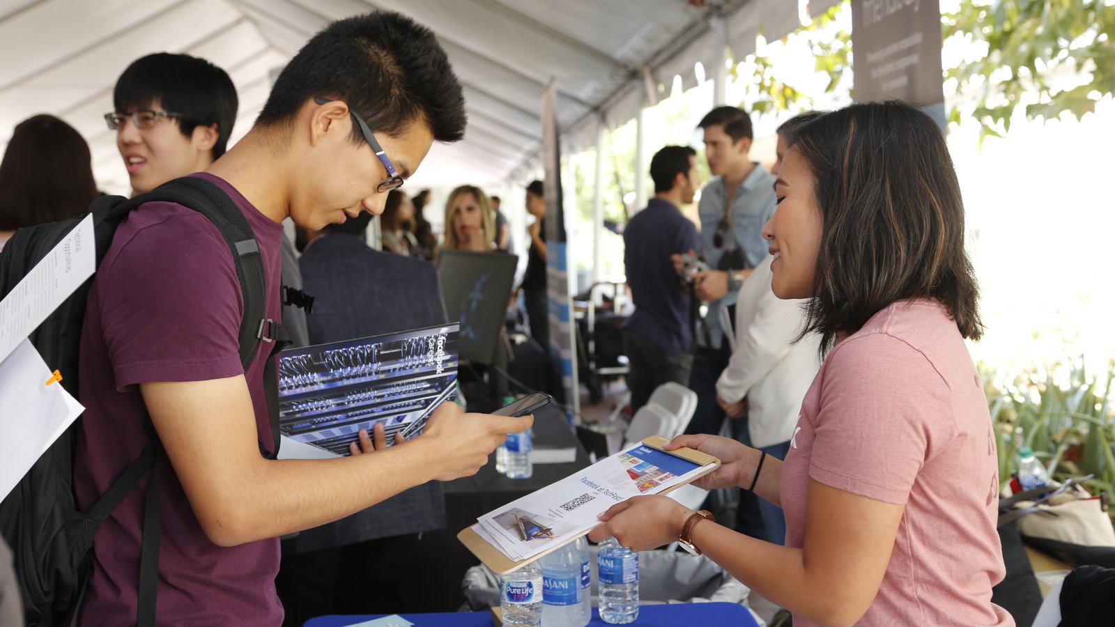 CMS-EE Partner company representative talking to student