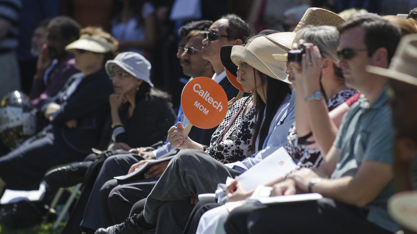 crowd with Caltech Mom sign