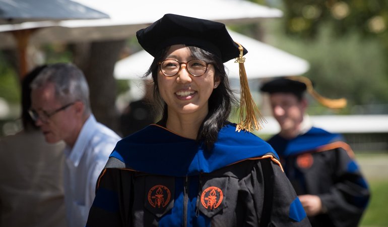 A female PhD graduate at the Commencement ceremony