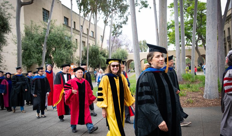 A procession of Caltech faculty in academic regalia at the Commencement ceremonly