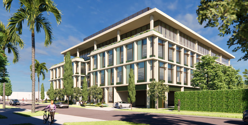 glass and concrete building with blue sky above