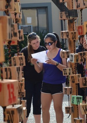 students solving puzzle