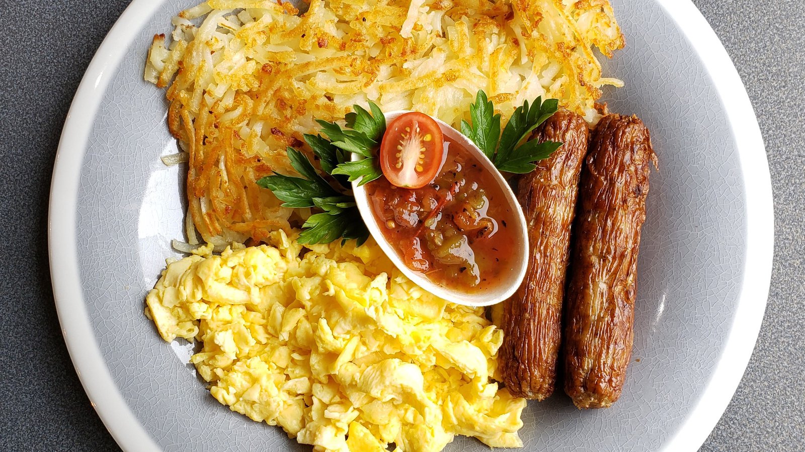 Scrambled eggs, sausage, hash browns