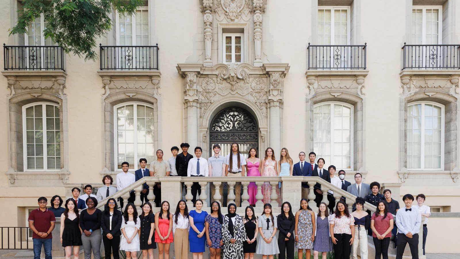 The 2023 FSRI Cohort of students standing in front of building for a class photo