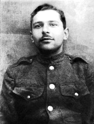 Student ID photo, head and shoulders portrait of young Mathisson, wearing soldier's garb.