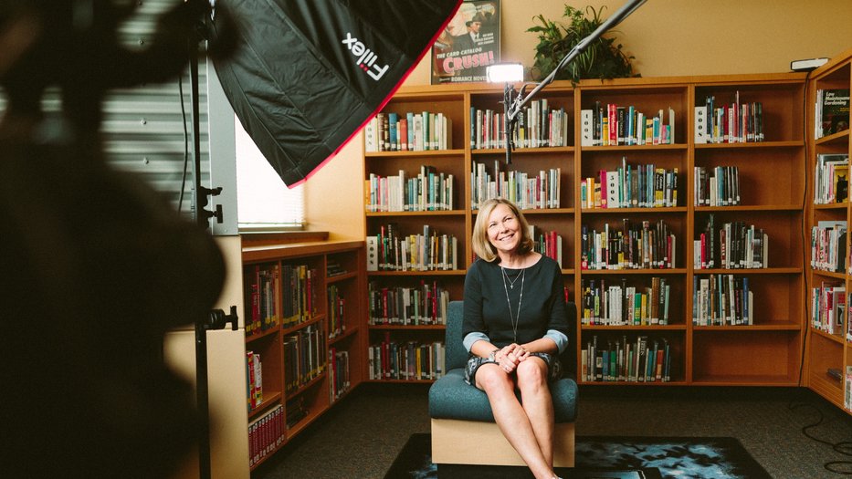 A photo of a woman being interviewed