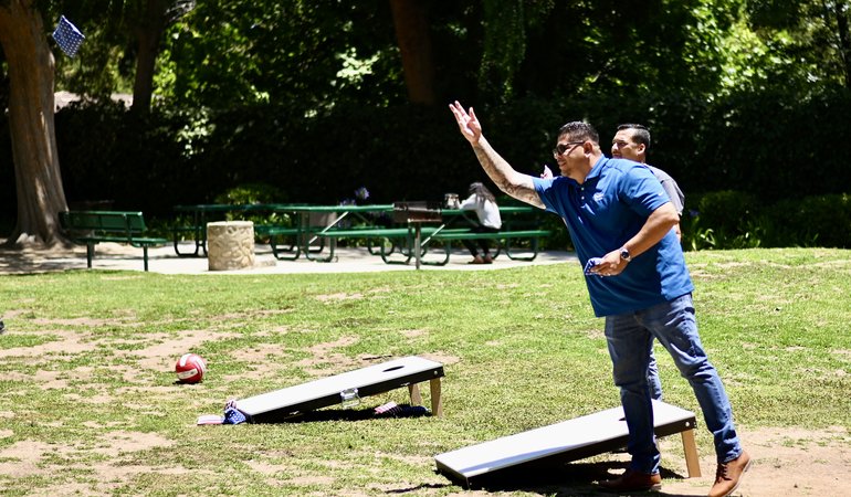 sal tossing the beanbag