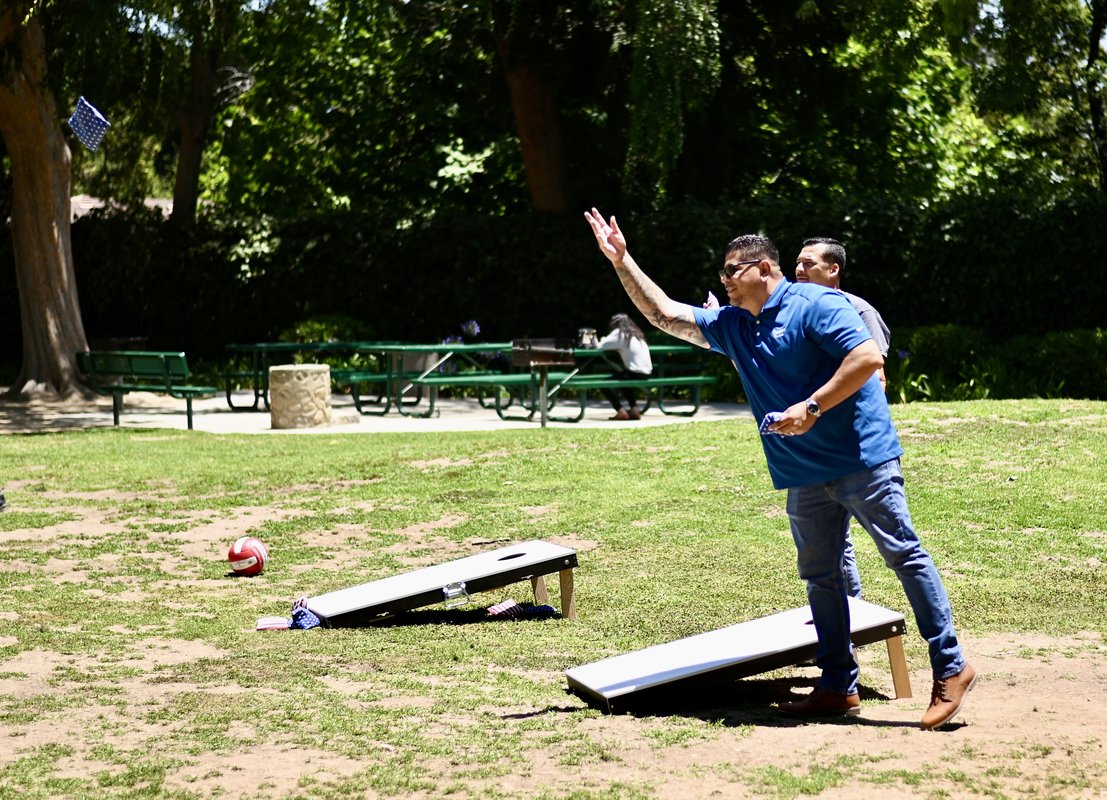 sal tossing the beanbag