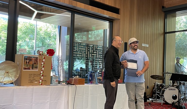 Randall McCain receiving Excellence in Customer Service Award