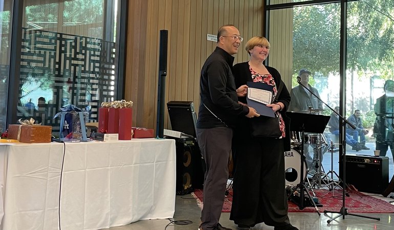 Rose Royal receiving Excellence in Customer Service Award