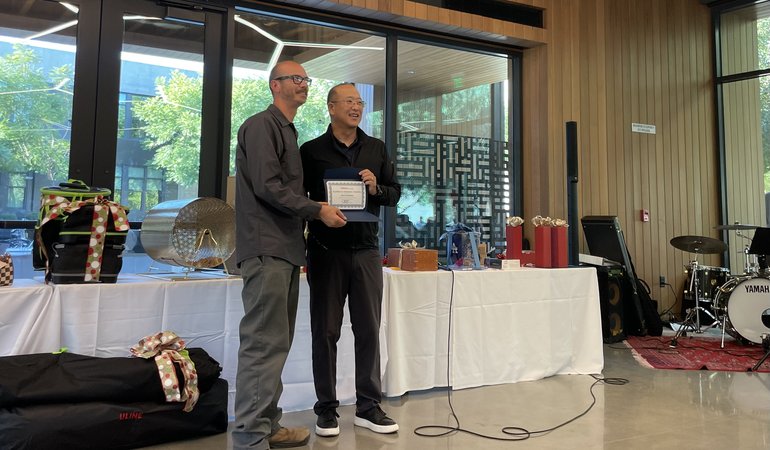 Mario Hernandez receiving Excellence in Innovation / Creativity Award