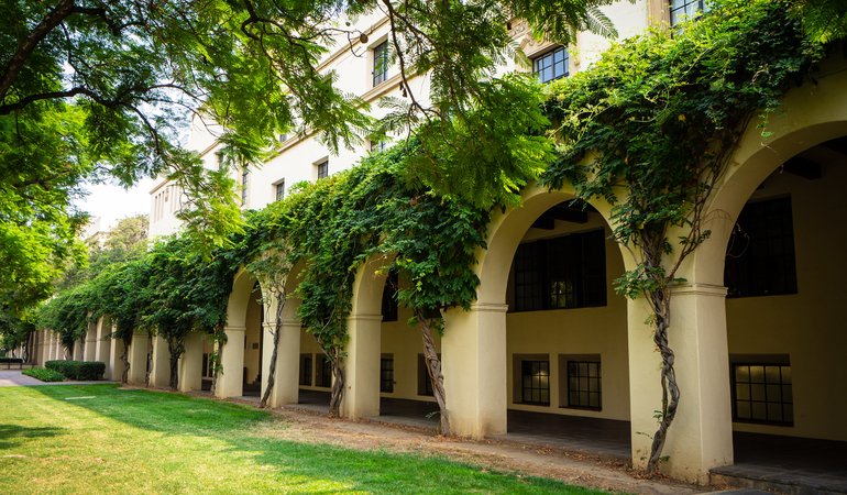 An exterior of a building with arches
