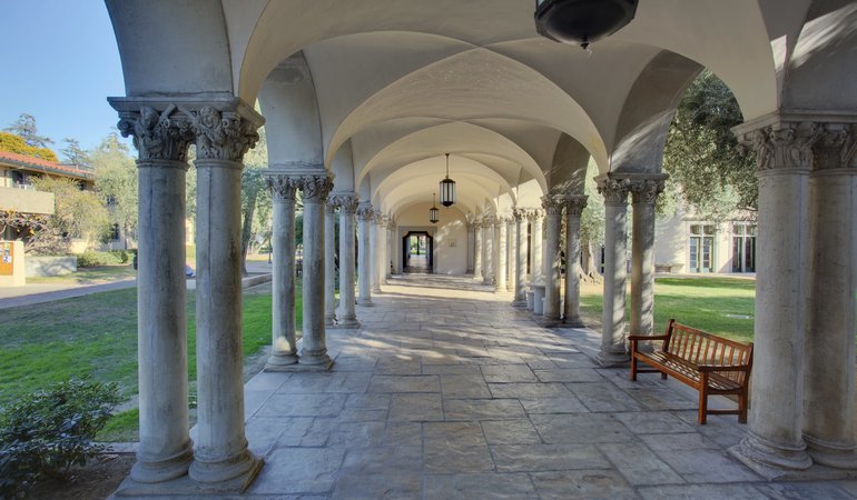 An arched walkway in an outdoor area