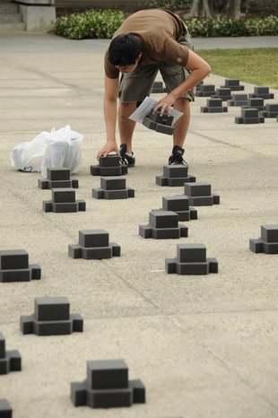 Student setting up foam markers