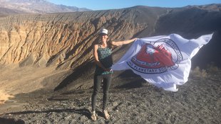 Juliet holding Caltech flag