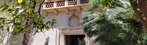 entrance to the Dabney House flanked by large orange trees