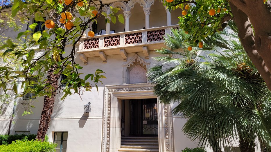 entrance to the Dabney House flanked by large orange trees