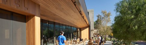 Student walks in front of Bechtel Residence