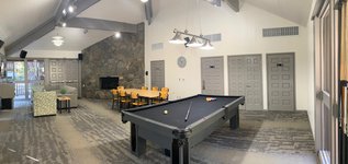 Inside the Catalina Rec Room featuring table, fireplace, and pool table.