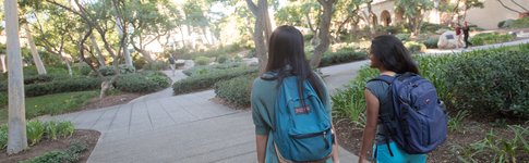 Students walking outside on campus