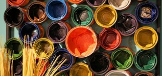 Colorful open paint cans