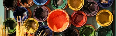 Colorful open paint cans