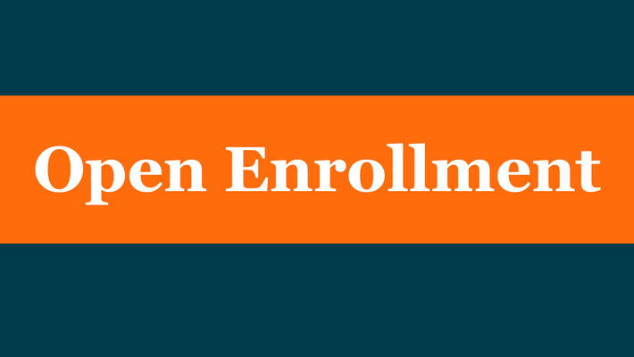 Dark blue and orange banner with text that says "Open Enrollment"