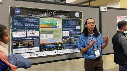 Aguilar presenting PANGEA at AGU Poster Session