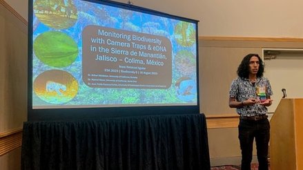 Isaac sharing an oral presentation at ESA