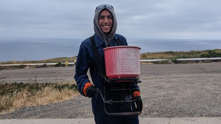 Isaac wearing a chest spreader for infestation treatments