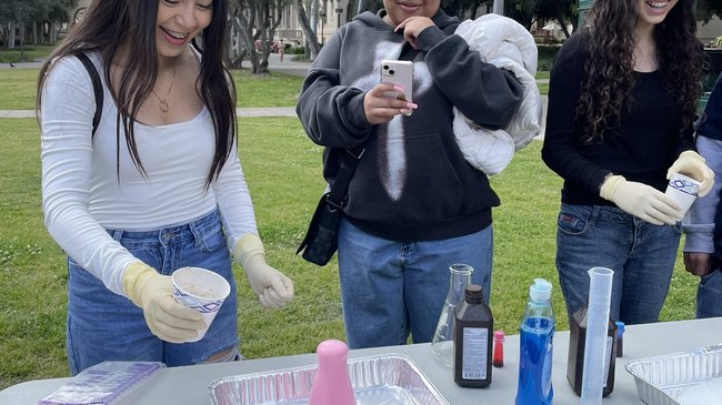 students trying elephant toothpaste demonstration