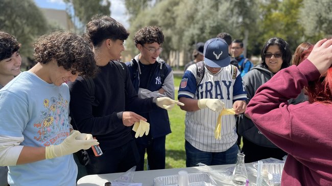 students trying elephant toothpaste demonstration