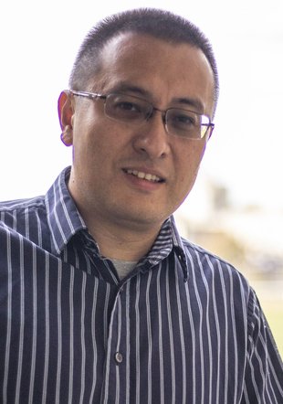 A man looking into the camera