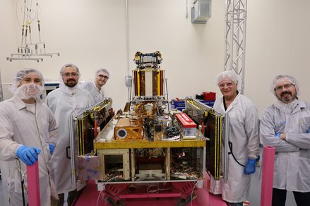 Engineers from Caltech with Momentus's Vigoride spacecraft after integrating DOLCE