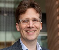 Headshot Tom Griffiths