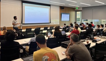 Gabriel Rojas Bowe teaching in modern classroom