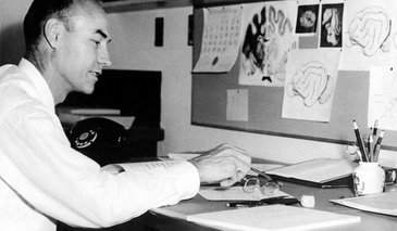Roger Sperry working at a desk