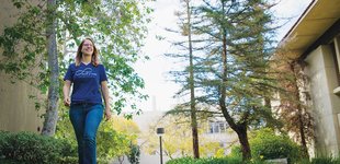 Kimberly See walking on campus