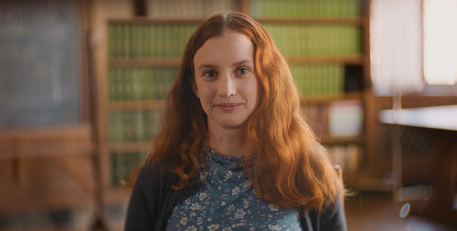 A person smiles for a photo