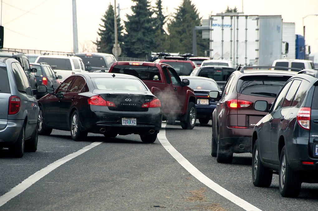 A photo of cars trying to merge in traffic.