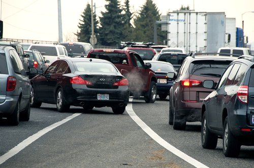 A photo of cars trying to merge in traffic.