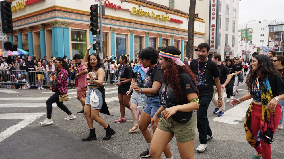 Caltech's group dances through the streets of Hollywood.