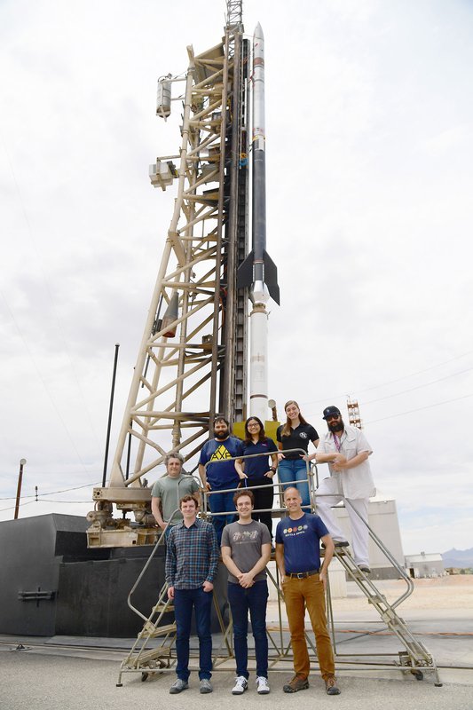 The CIBER-2 team poses with the rocket experiment.