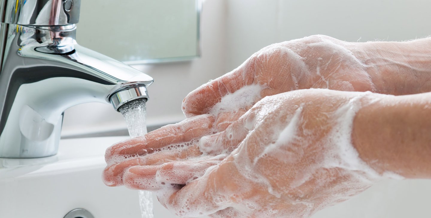 Photo of hand washing.