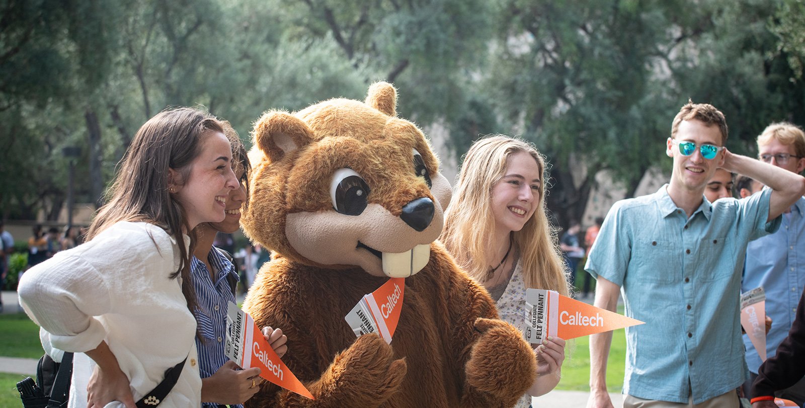 Students pose for photos with Berni the Beaver
