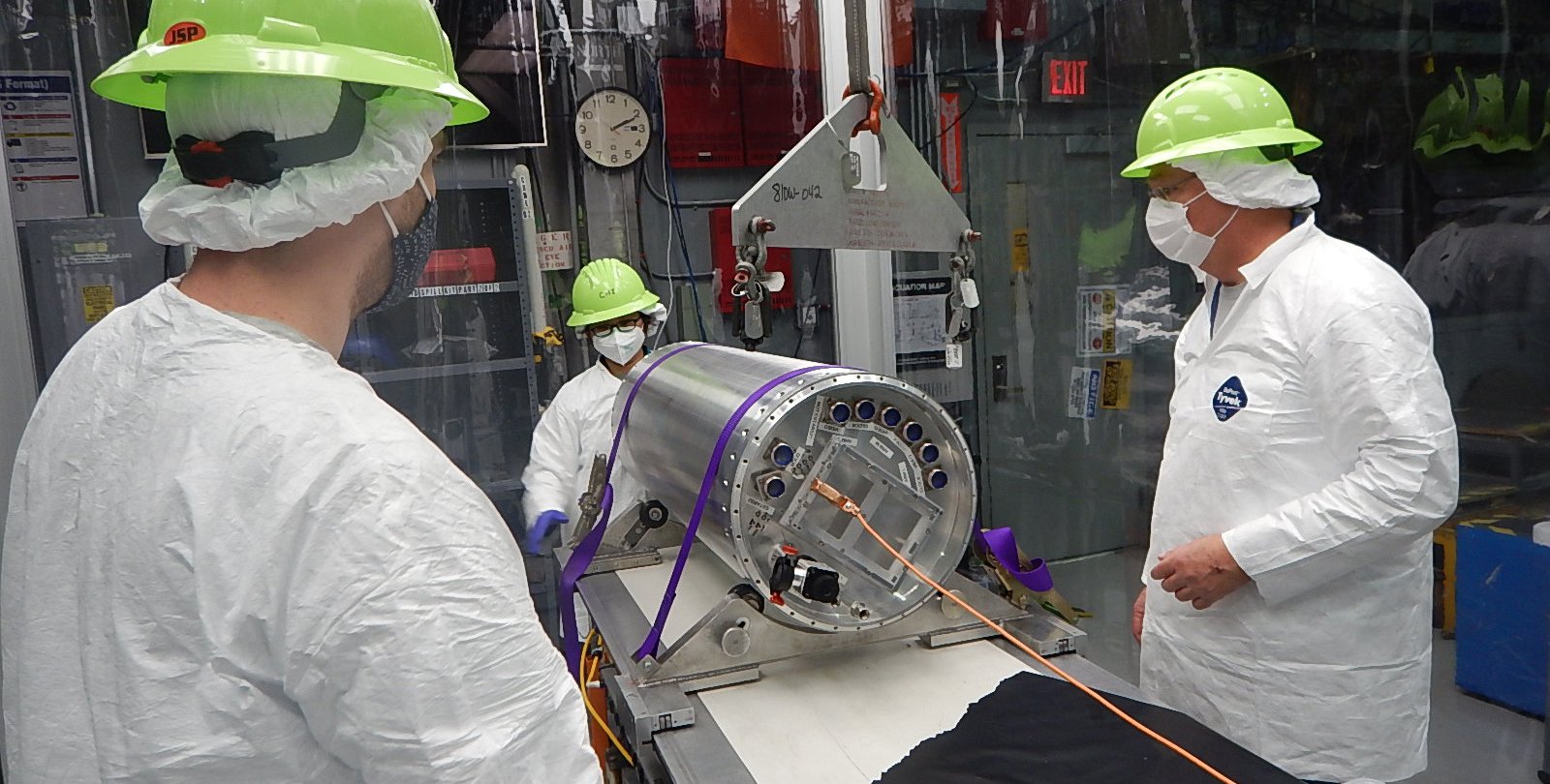 Richard Feder-Staehle, Chi Nguyen, and Rick Evavold of the CIBER-2 team working on the CIBER-2 payload.
